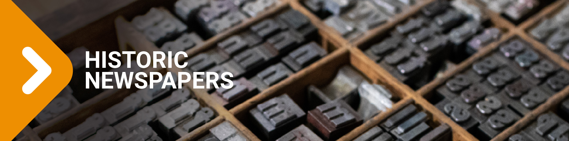 "Historic Newspapers" arrow graphic over photo of divided trays of letter press letters